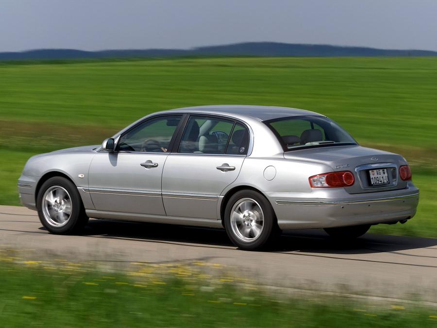  Kia Opirus 2003 года  (фото 32 из 54)